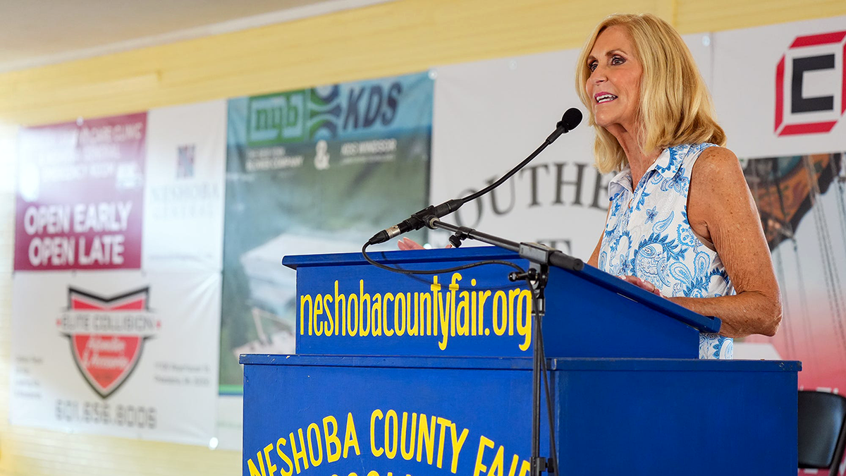 Mississippi Attorney General Lynn Fitch addresses fairgoers in Philadelphia, Miss.
