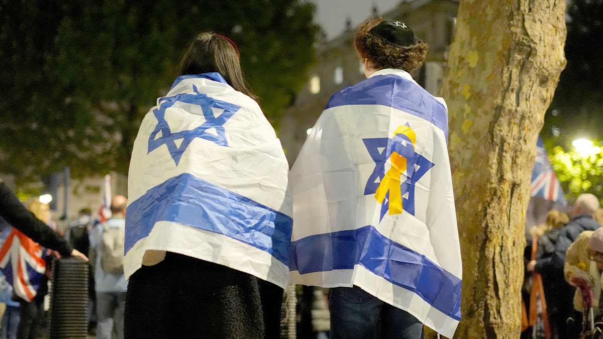 People gather outside to show solidarity against antisemitism.