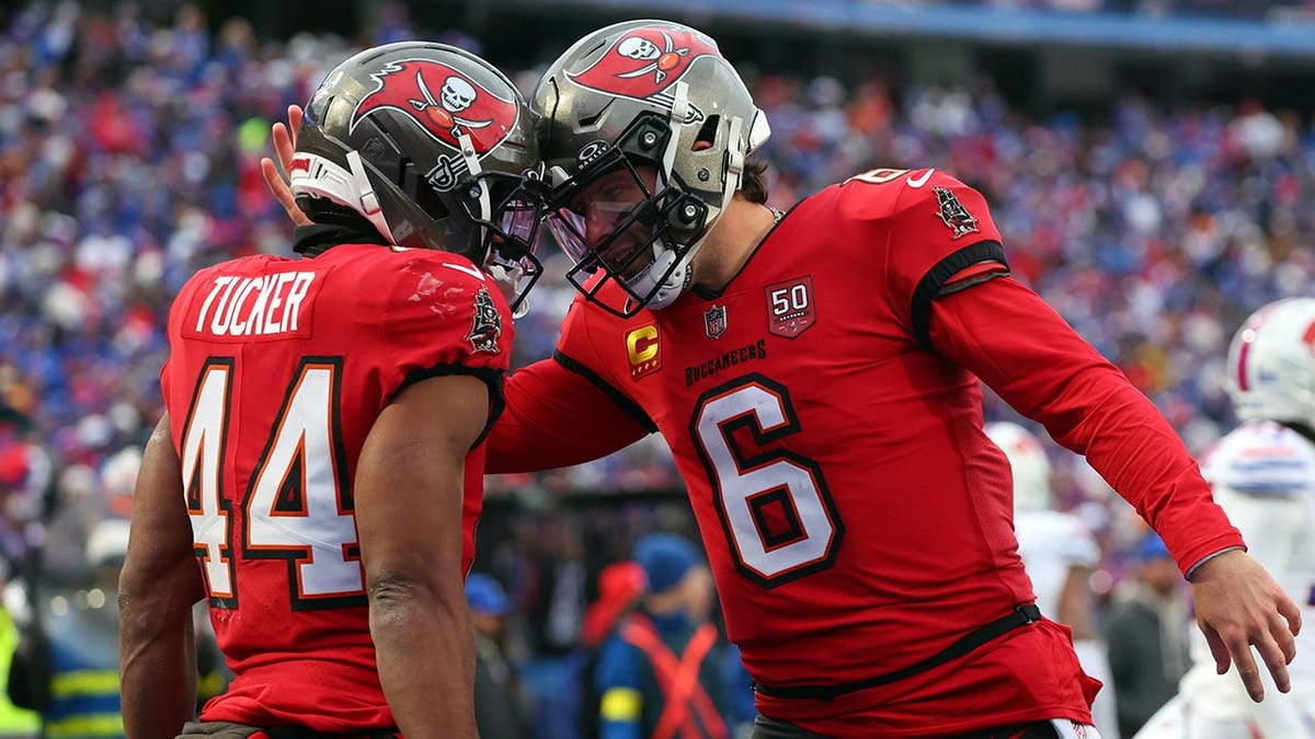 Baker Mayfield with Sean Tucker