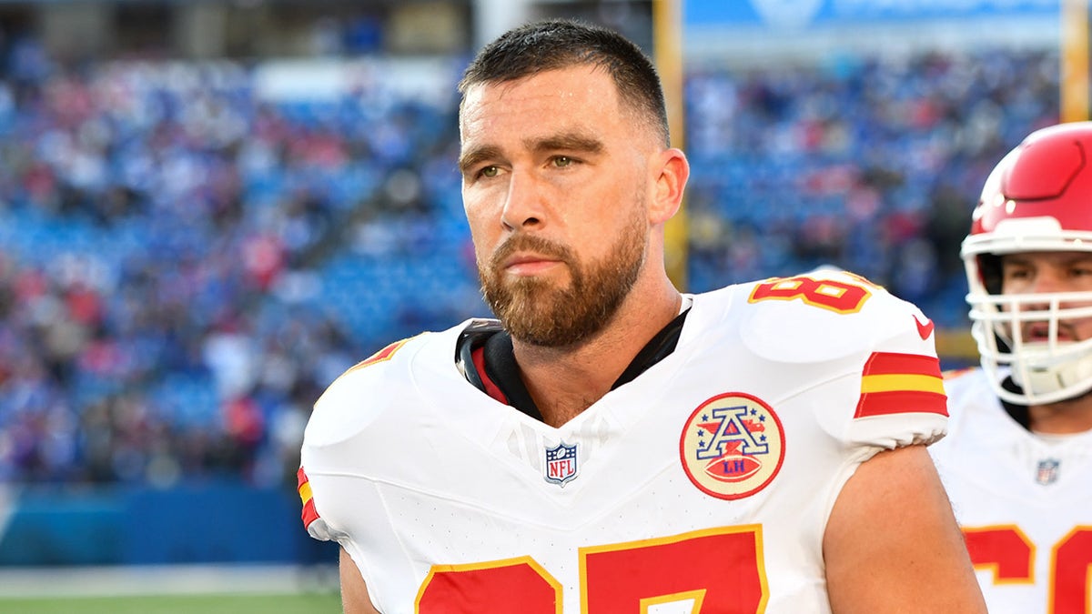 Travis Kelce looks on