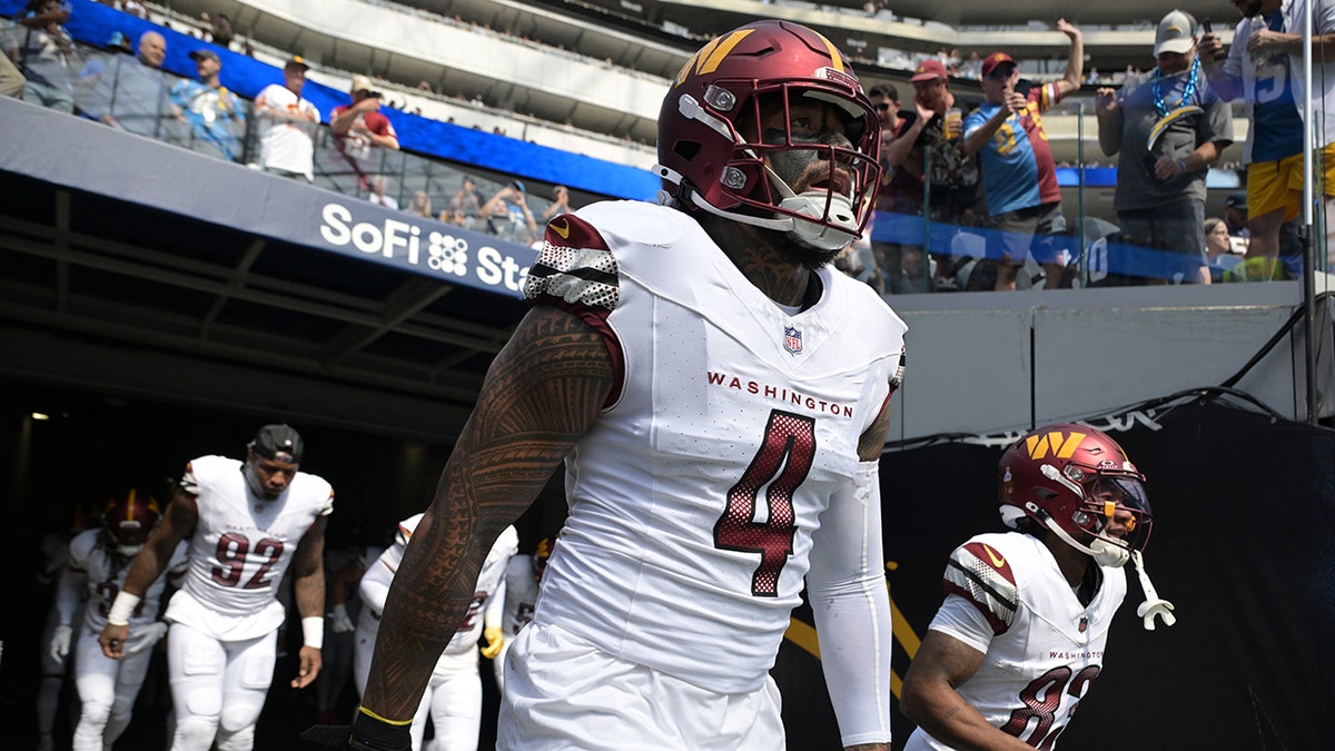Frankie Luvu enters the field vs Chargers