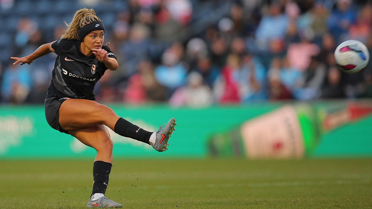 Sarah Gorden kicks the ball