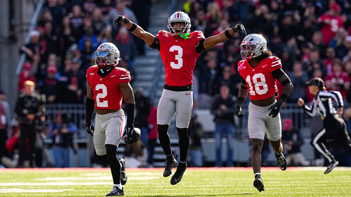 Ohio State defensive backs celebrate