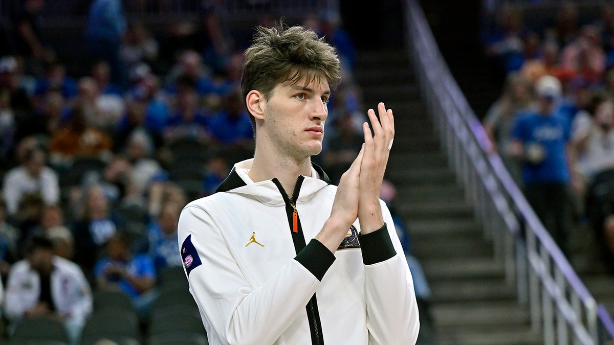 Olivier Rioux looks on