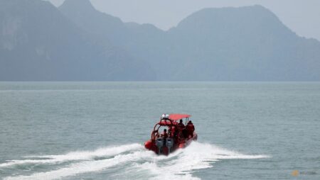 Eleven found dead in Thai-Malaysia search after Rohingya migrant boat sinks 
