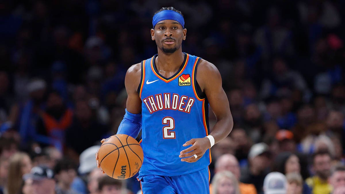 Shai Gilgeous-Alexander dribbles