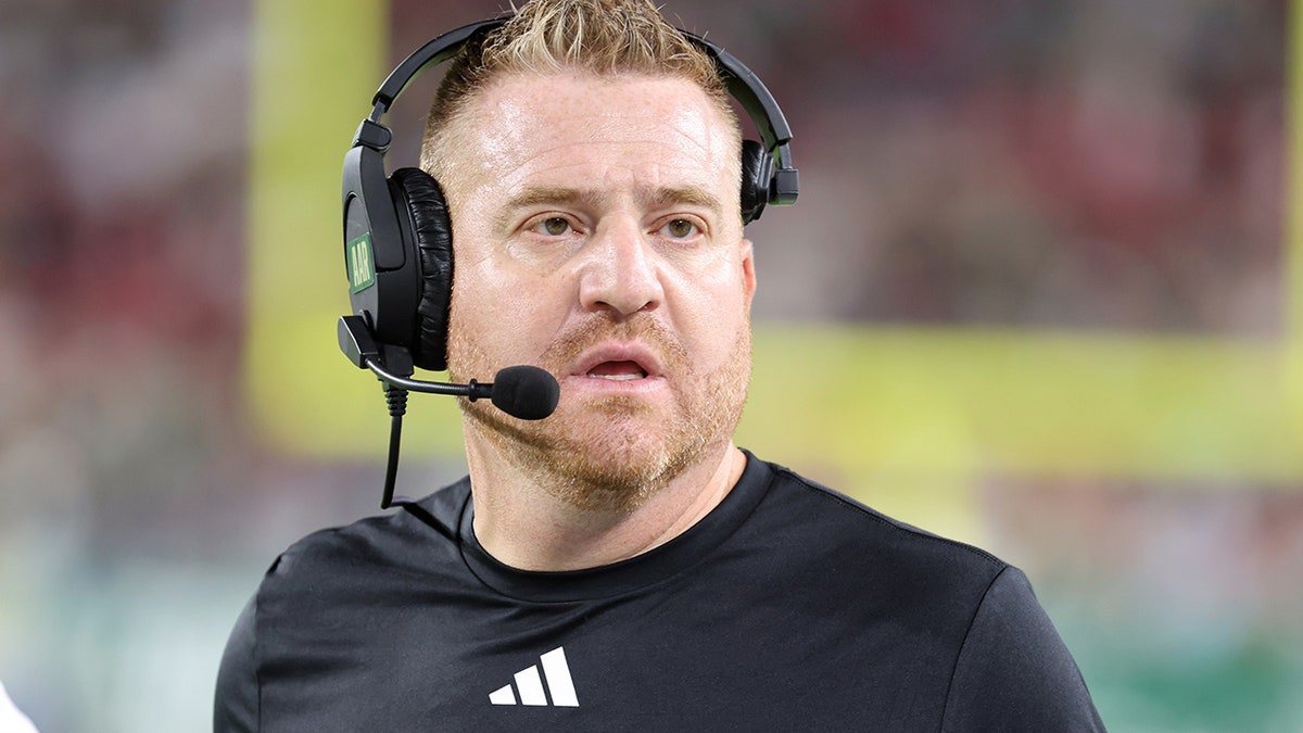 Alex Golesh looks on vs UTSA