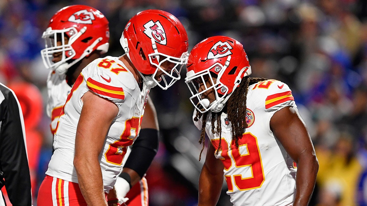 Travis Kelce and Kareem Hunt celebrate