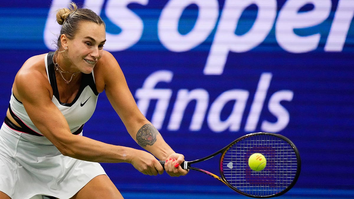 Aryna Sabalenka returns a shot