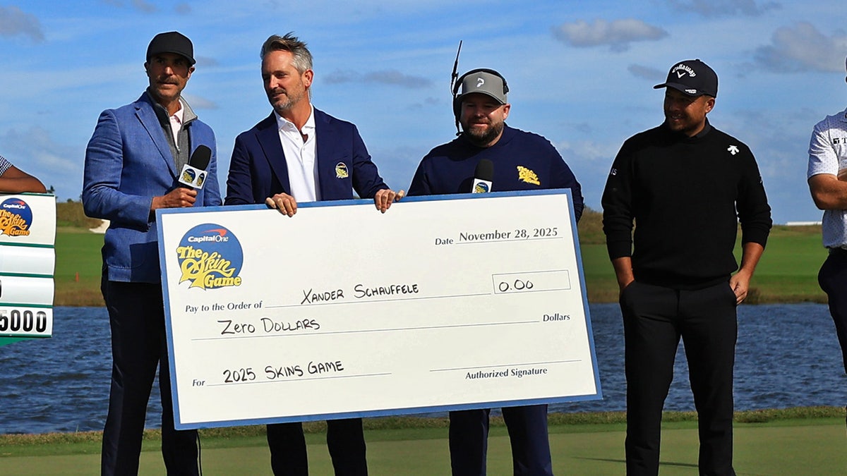 Xander Schauffele with check