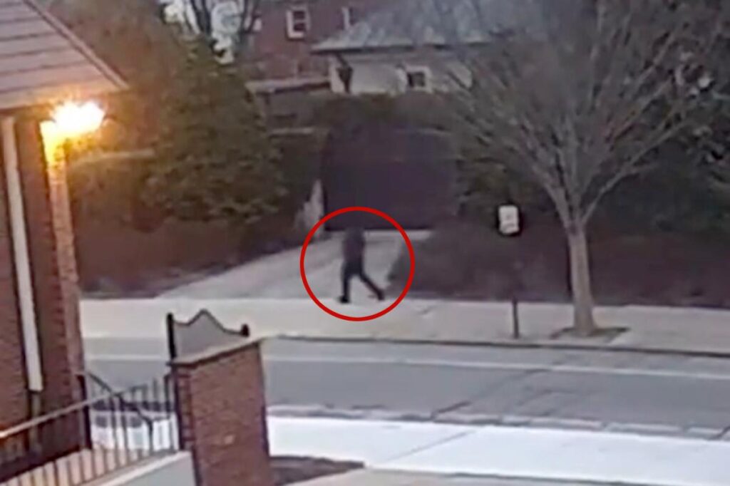 Cops release very grainy new video of suspected Brown shooter — as they hunt for new leads after POI released