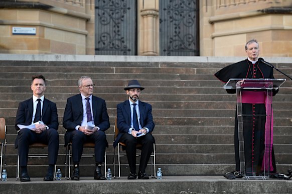 NSW Premier Chris Minns, Prime Minister Anthony Albanese and Rabbi Benjamin Elton listen to Sydney Catholic Archbishop Anthony Fisher at an interfaith ceremony in Sydney on Wednesday.