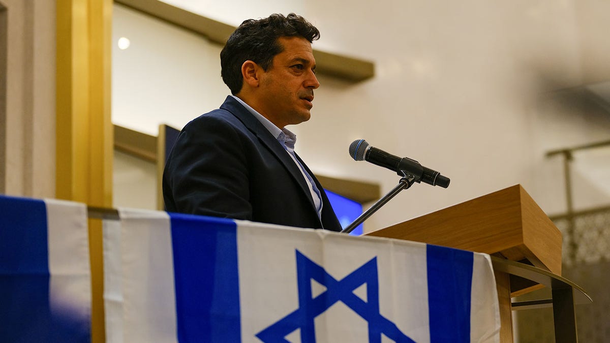 Israeli Minister For Diaspora Affairs and Antisemitism, Amichai Chikli speaking at a funeral service.