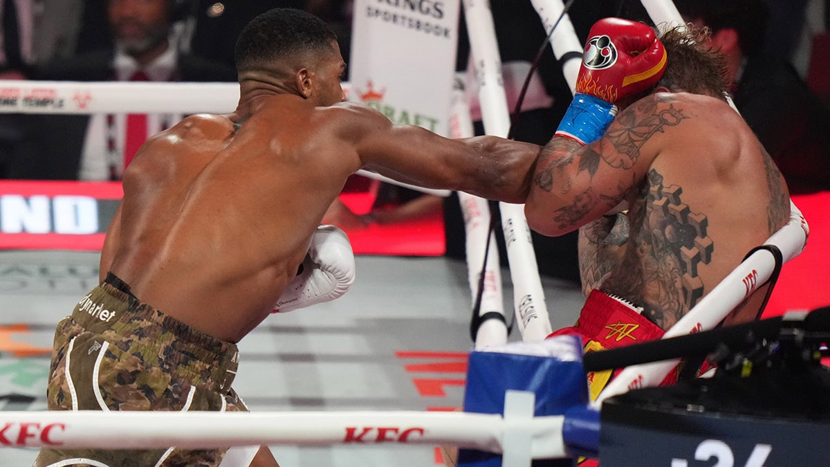 Anthony Joshua throws some punches