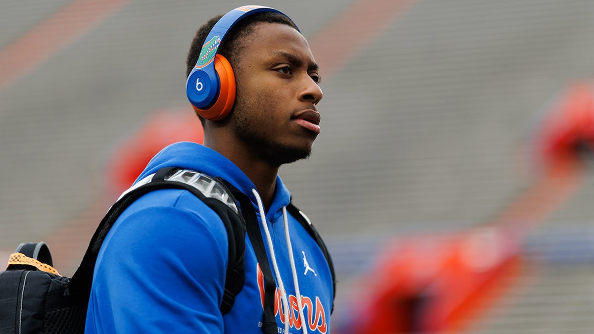 DJ Lagway walks onto the field