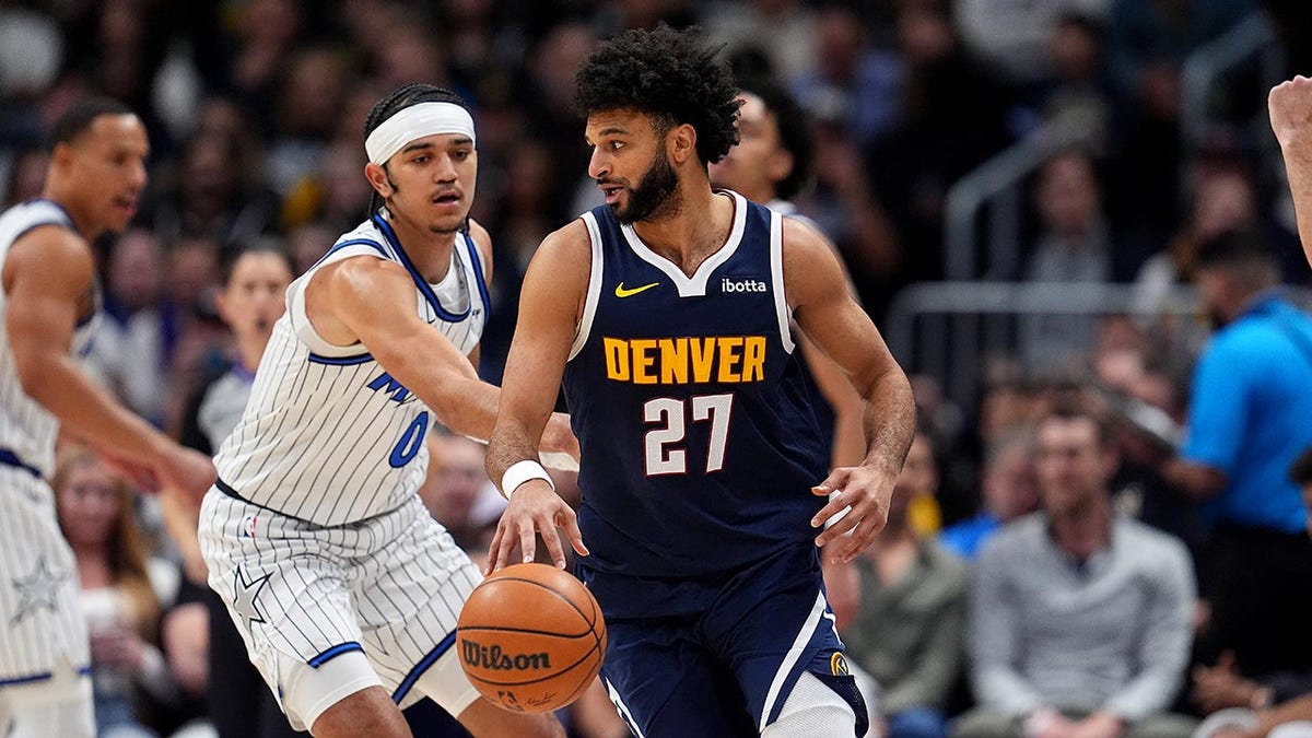 Jamal Murray drives to basket