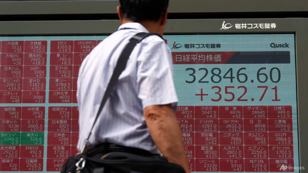 Stocks mostly rise, precious metals slip in quiet Asian trade