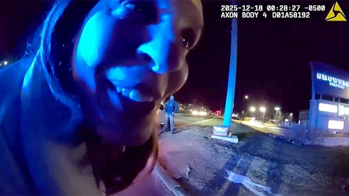 Maria Bucci stares into police bodycam