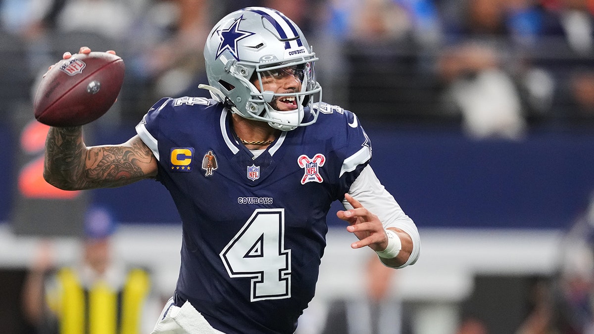 Dak Prescott looks to pass