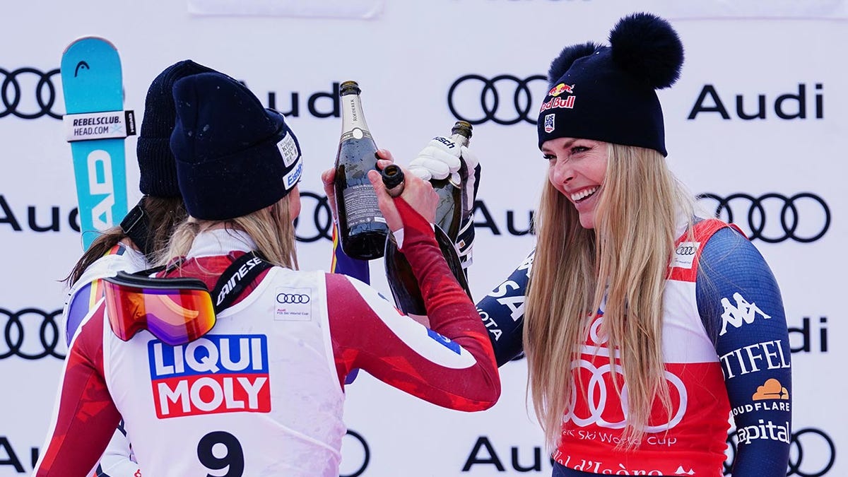 Lindsey Vonn celebrates on the podium