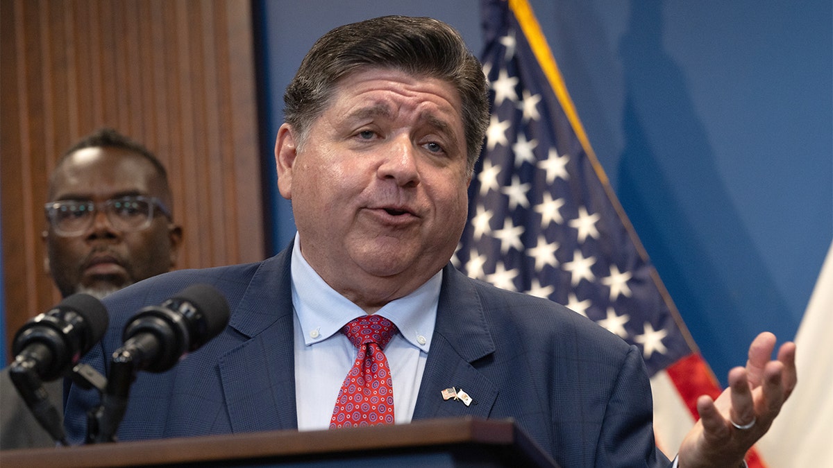 JB Pritzker speaks at a press conference