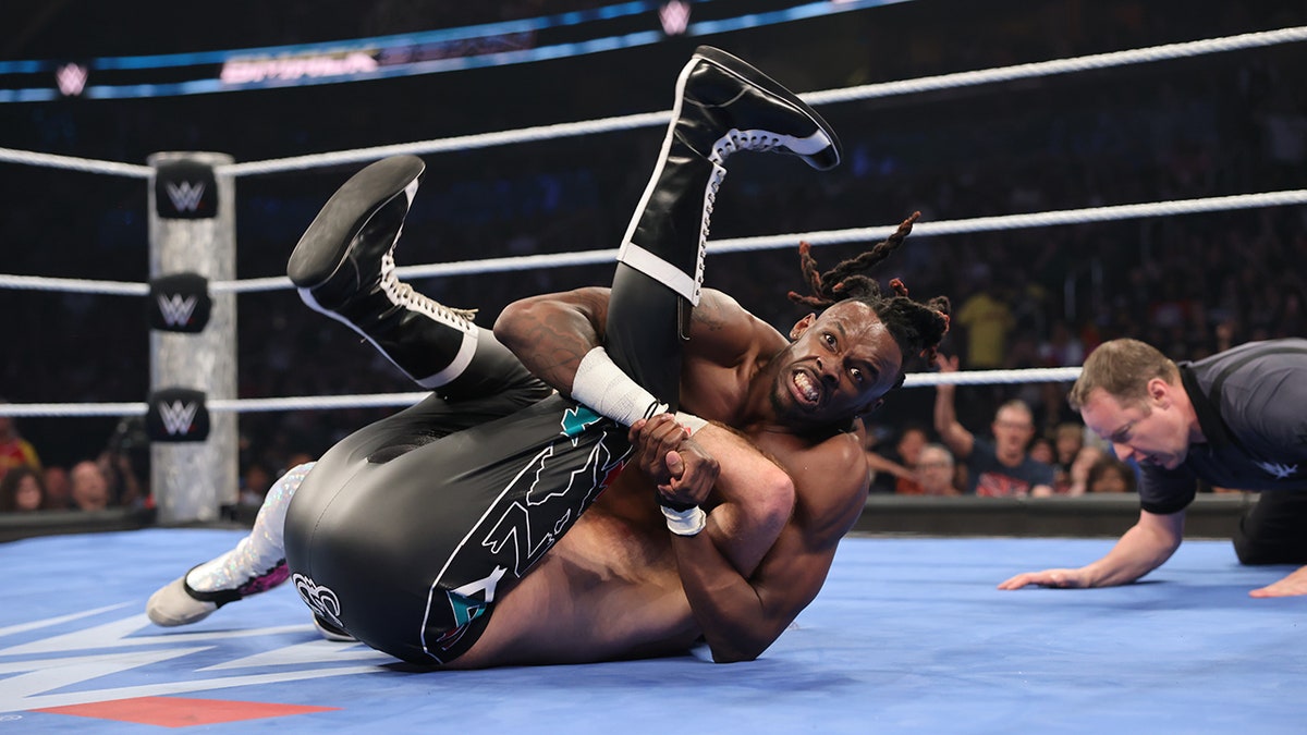 Je'Von Evans attempts to pin Sami Zayn