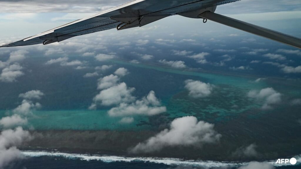 China conducts naval, air patrols around disputed South China Sea shoal