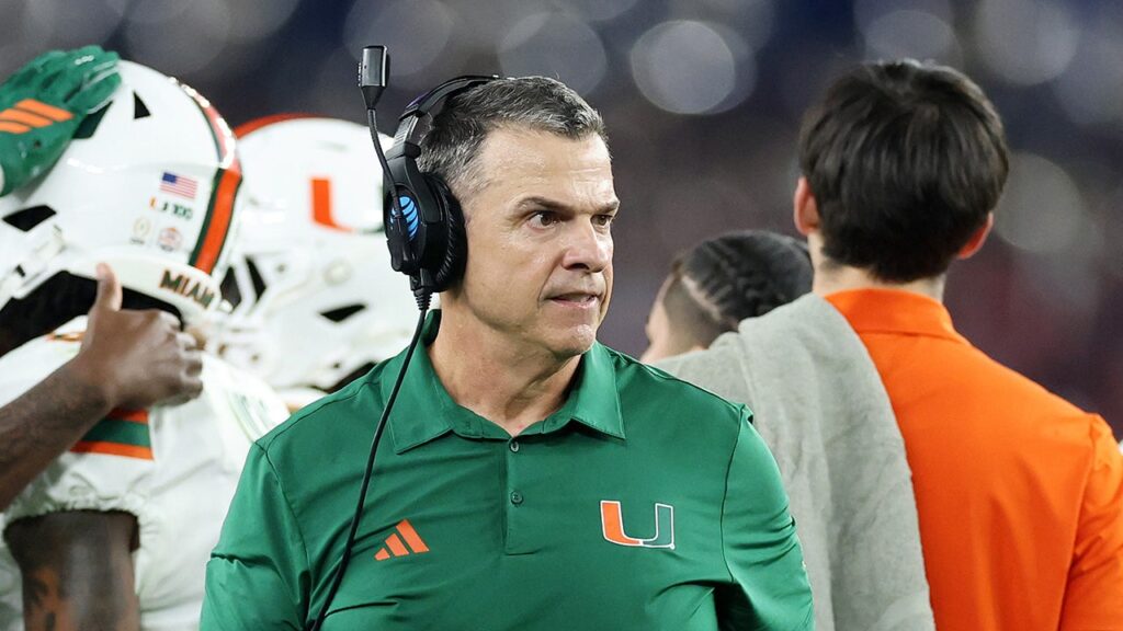 Miami coach Mario Cristobal wrestles out of hug after Carson Beck’s touchdown in viral moment