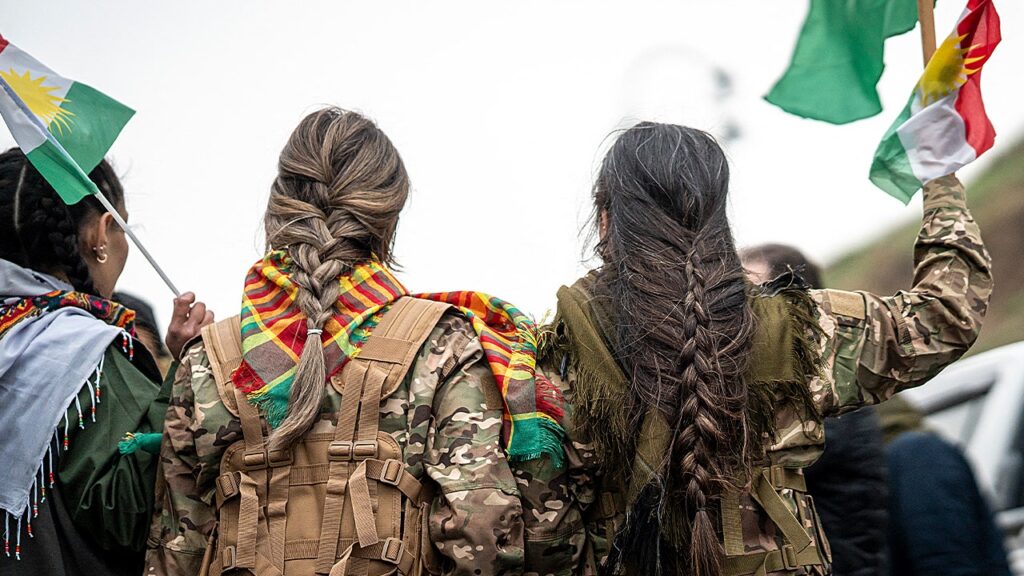Syrian militiaman shows off what he claims to be severed Kurdish fighter’s braid as Damascus asserts control Syrian militiaman shows off what he claims to be severed Kurdish fighter’s braid as Damascus asserts control