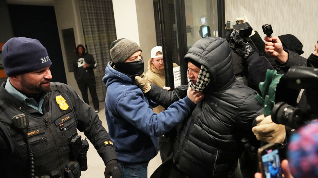 Anti-ICE agitators clash with federal agents at Minneapolis hotel, as agents deploy tear gas, flashbangs Anti-ICE agitators clash with federal agents at Minneapolis hotel, as agents deploy tear gas, flashbangs