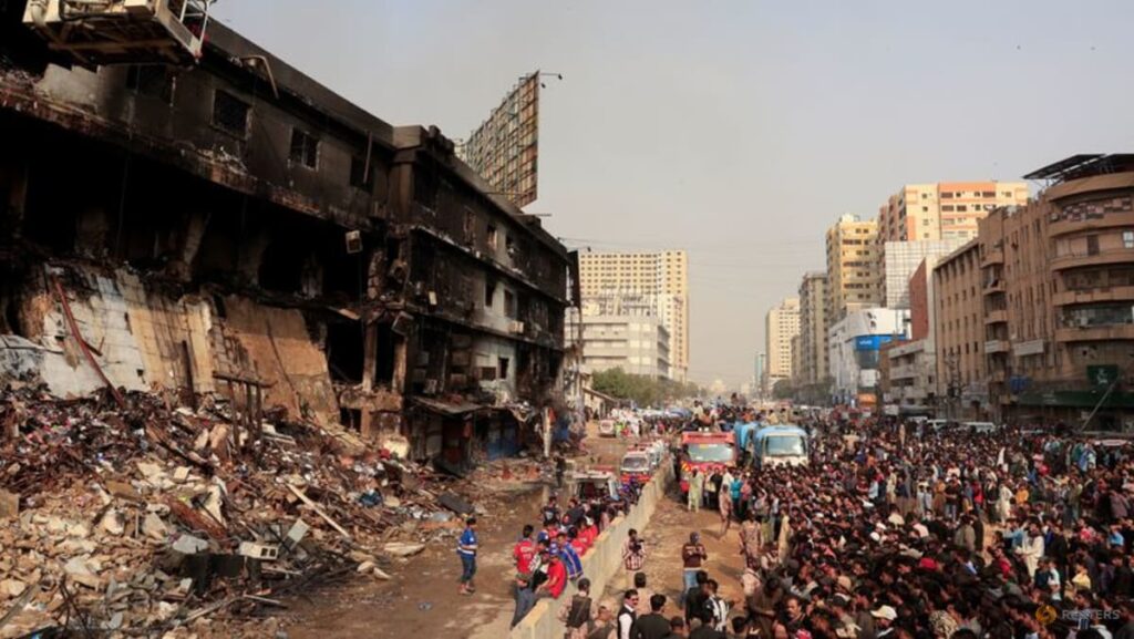 Karachi mall fire death toll rises to 23 as rescuers search for dozens missing
