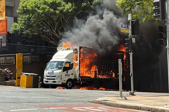 A truck was in flames on Ann Street outside Central Station in the Brisbane CBD on Thursday.