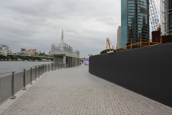The strip links the end of Charlotte Street with Alice Street, near the city-side entrance to the Kangaroo Point Bridge. 