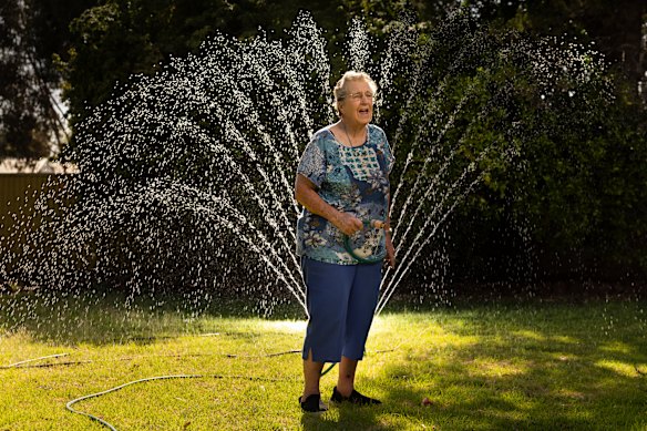Moyne Hahnel, 93, put on her sprinkler to save her garden in the Ouyen heat.