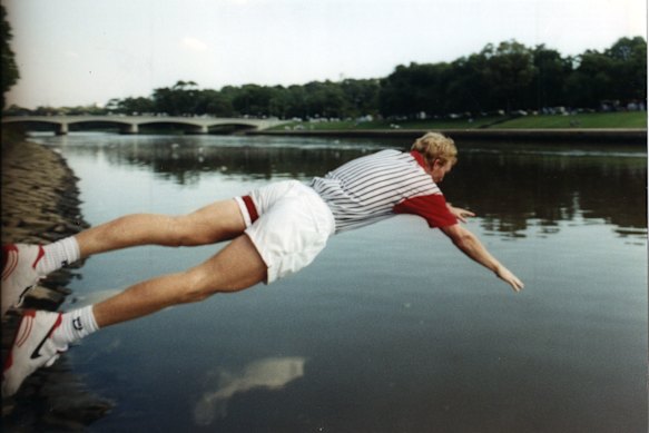 Jim Courier takes a victory dip in the Yarra after winning the Australian Open in 1993. 