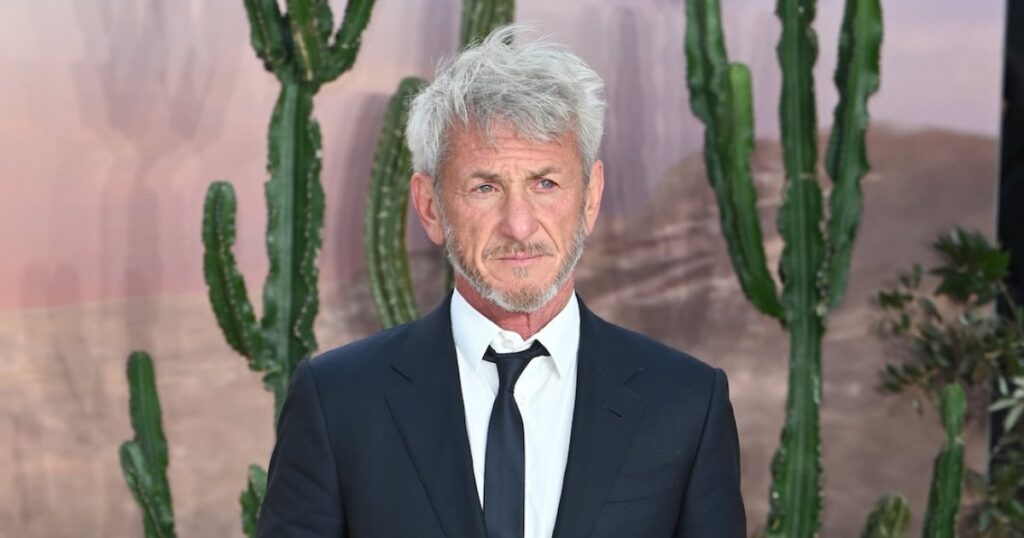 Sean Penn Smokes Cigarette Inside 2026 Golden Globes After Nikki Glaser’s ‘Leather Handbag’ Joke