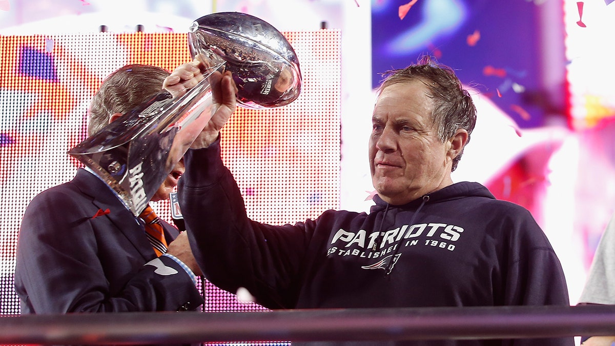 Belichick with Lombardi Trophy