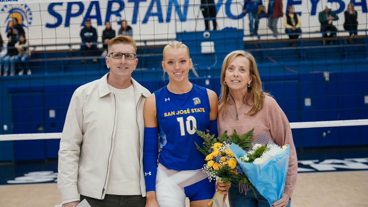 Former San Jose State University women's volleyball star Brooke Slusser with her parents, Paul and Kim Slusser.