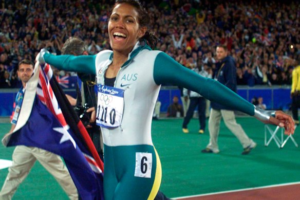 Cathy Freeman after winning gold at the Sydney Olympic Games in September 2000.