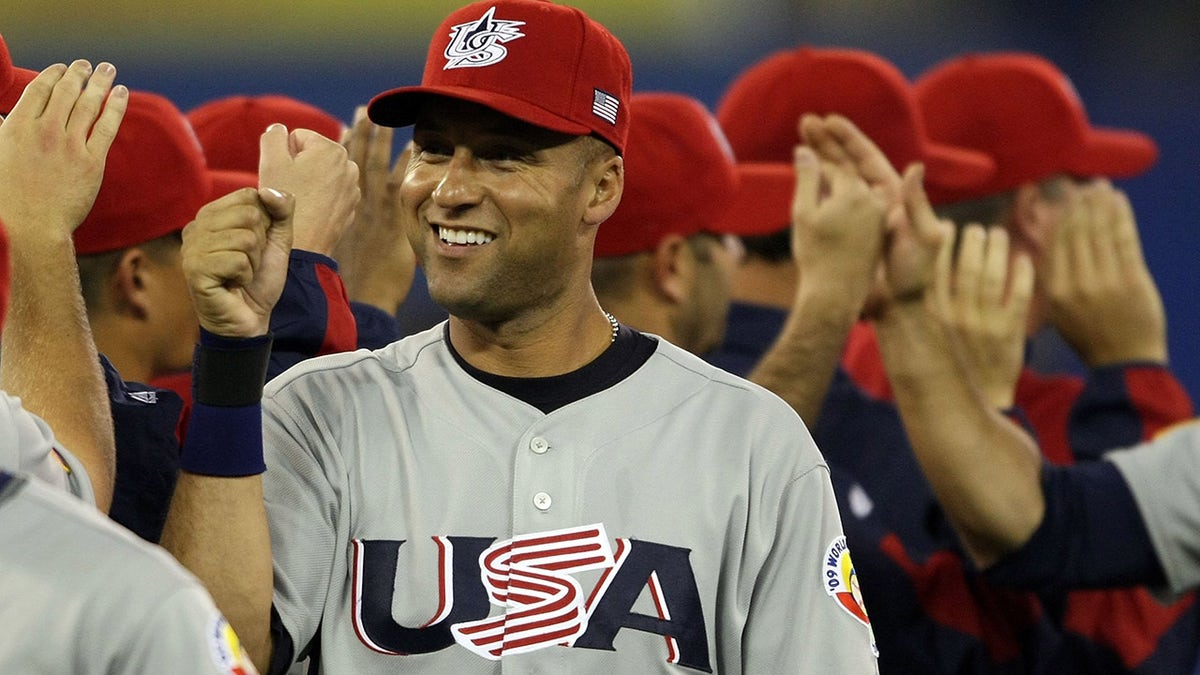 Derek Jeter high fiving