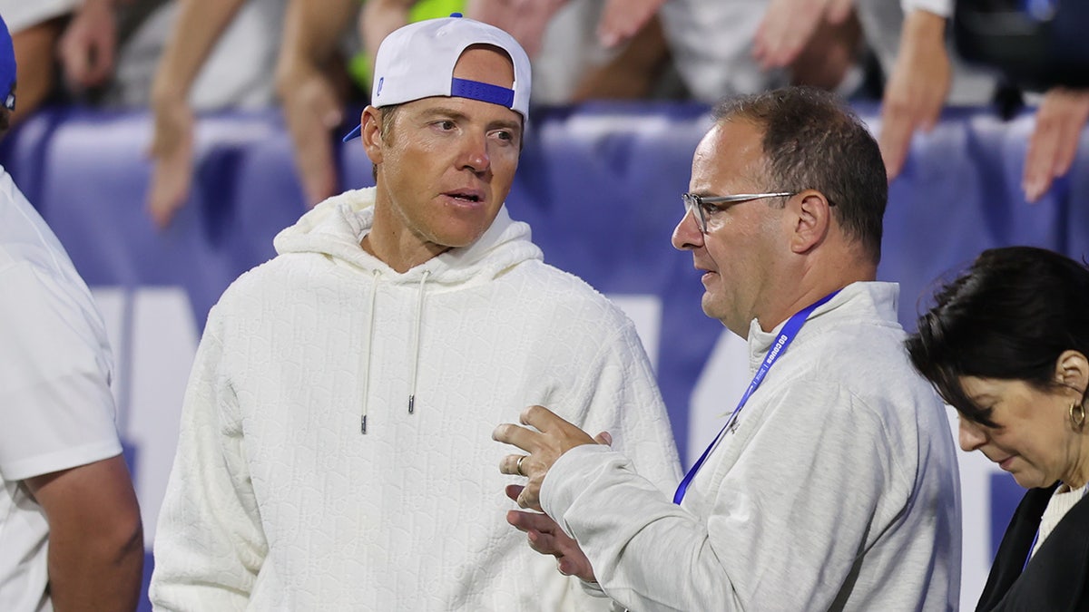 Adrian Wojnarowski talks to Ryan Smith