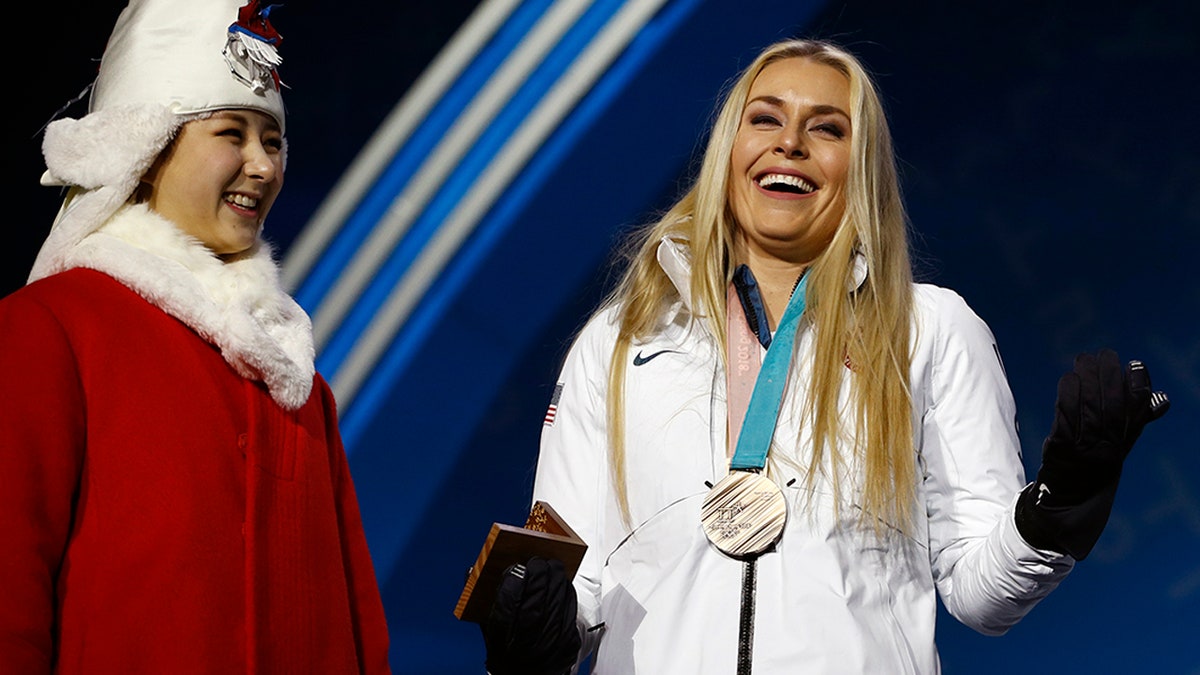 Bronze medalist in the women's downhill Lindsey Vonn, of the United States, smiles during the medals ceremony at the 2018 Winter Olympics in Pyeongchang, South Korea, Wednesday, Feb. 21, 2018. (AP Photo/Charlie Riedel)