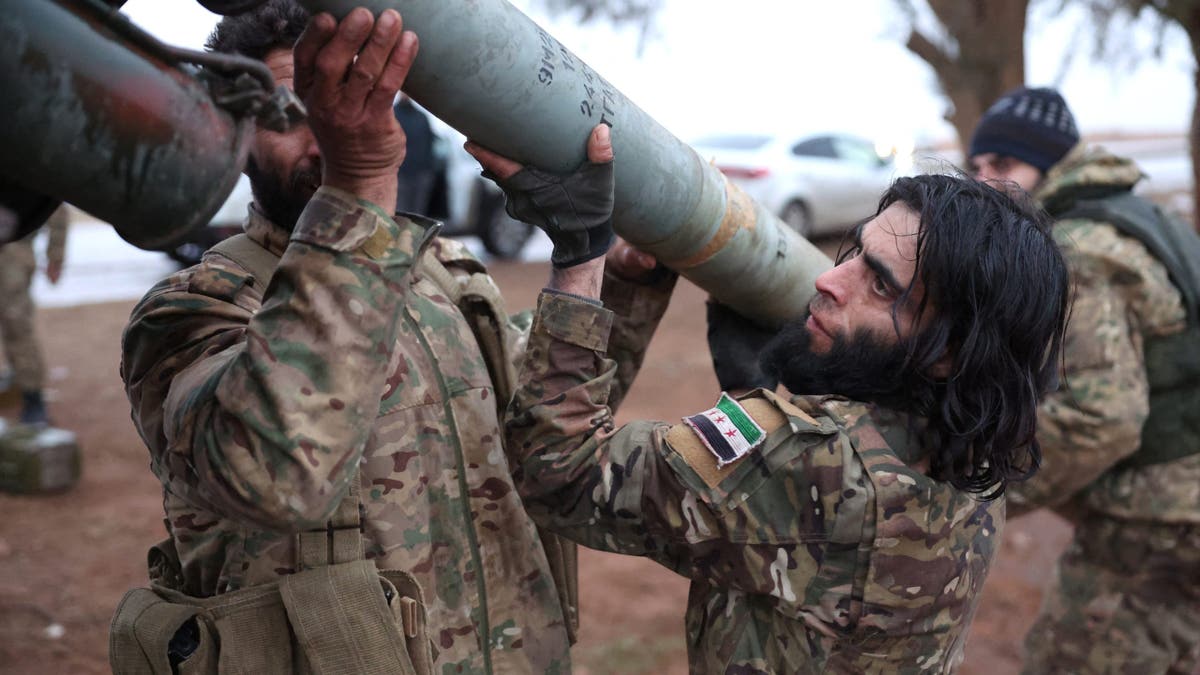 Syrian armed forces fight Kurds in northern Syria