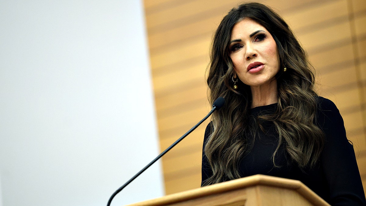 Kristi Noem delivers remarks at podium