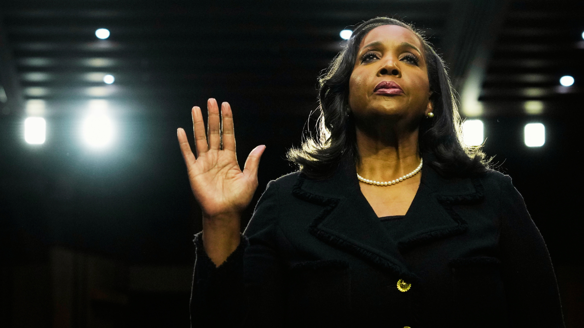 Lisa Cook takes an oath before congressional testimony on June 21, 2023 in Washington.