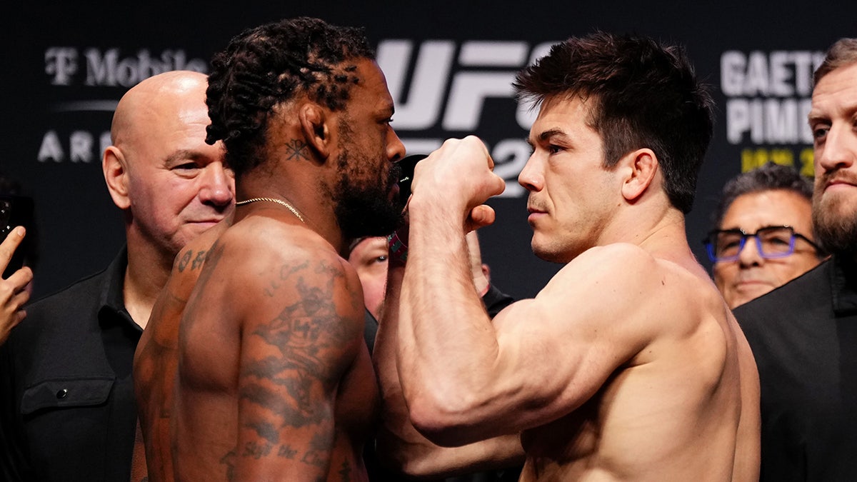 Michael Johnson and Alex Hernandez stare down