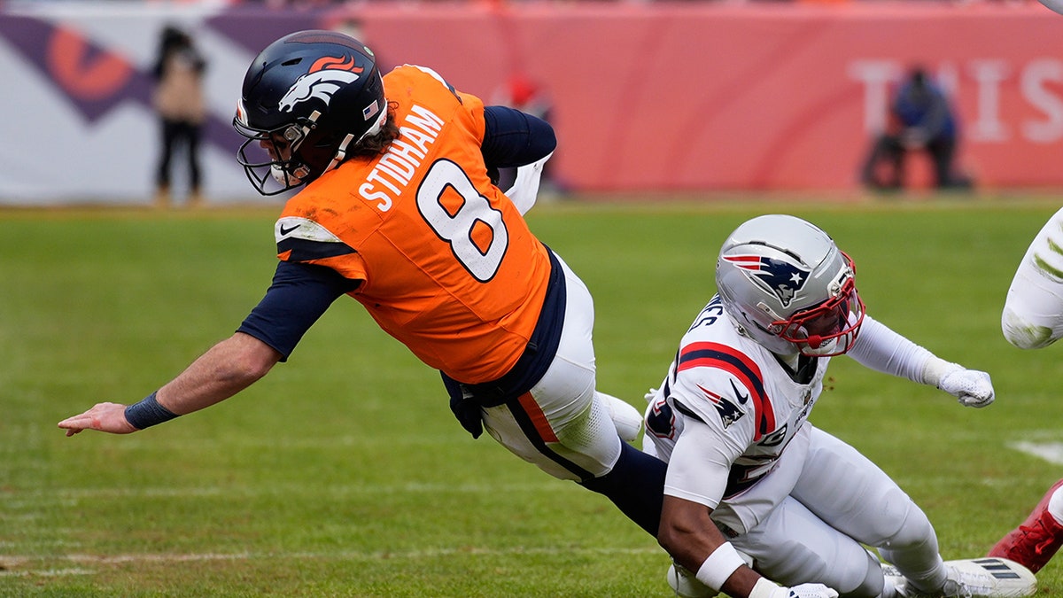 Jarrett Stidham is tackled
