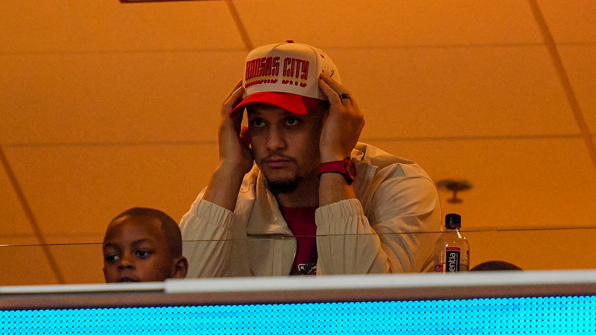 Patrick Mahomes watches games from a suite