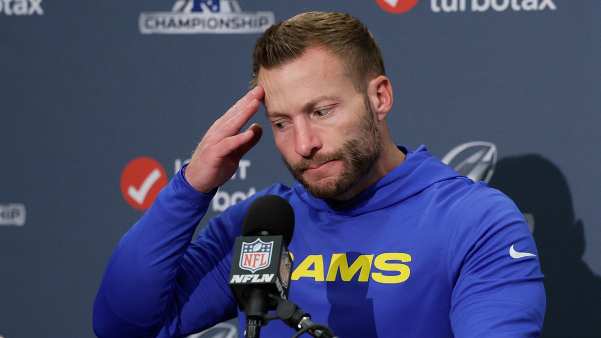 Sean McVay talks to reporters