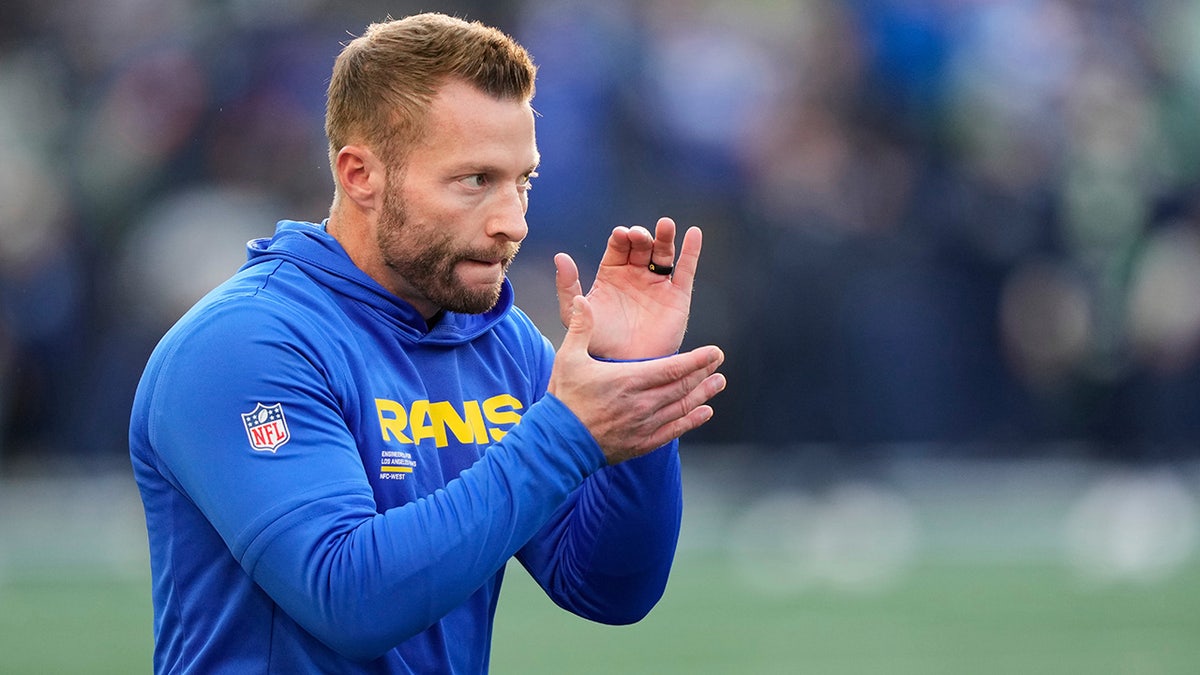 Sean McVay slaps on the sideline